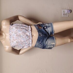 MEDIUM STRAPLESS CROP TOP SILHOUETTE ABSTRACT FLORAL PRINT.